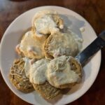 fried green tomatoes topped with our homemade crawfish sauce